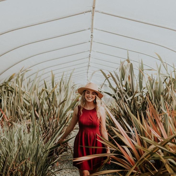Alex Rivera, Lead Design Curator at SmithPaperPress, reviewing corporate floral arrangements